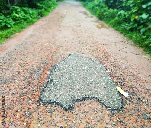 In Jhenaidah, Bangladesh, 08 august 2021, blurred view of damaged road. Bad condition of road in Jheaidah of Bangladesh.
