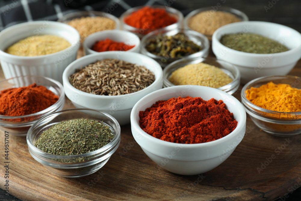 Bowls with different aromatic spices, close up