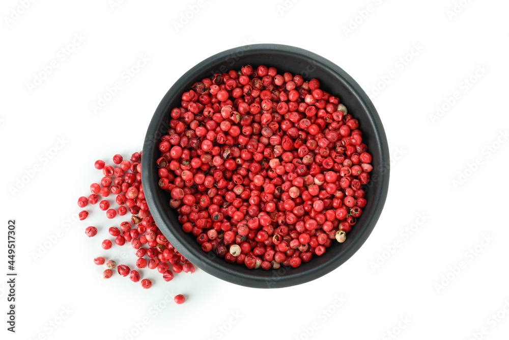 Black bowl of red peppercorns isolated on white background Black bowl of red peppercorns isolated on white background