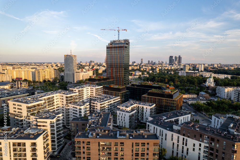 Naklejka premium Warsaw during the day. Busy city seen from above on a beautiful sunny day. The largest city in Poland, shown in a wonderful way.