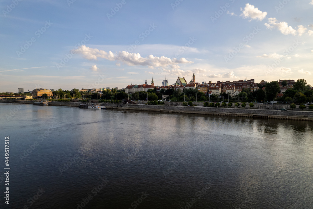 Naklejka premium Warsaw during the day. Busy city seen from above on a beautiful sunny day. The largest city in Poland, shown in a wonderful way.