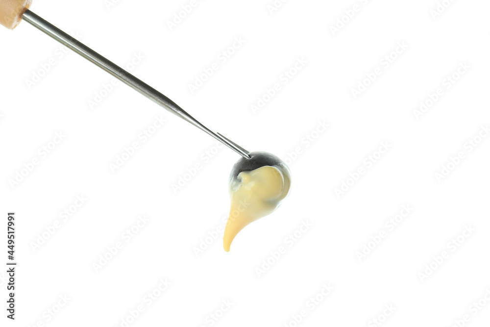 Fork with grape and fondue isolated on white background Fork with grape and fondue isolated on white background