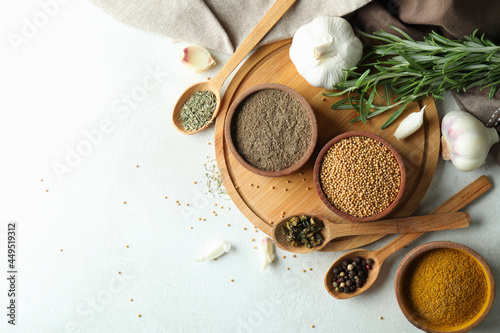 Fototapeta Naklejka Na Ścianę i Meble -  Concept of aromatic spices on white textured table