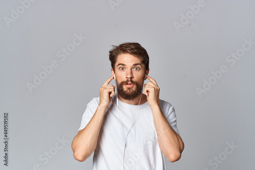 man in white t-shirt attractive look fashion casual wear light background