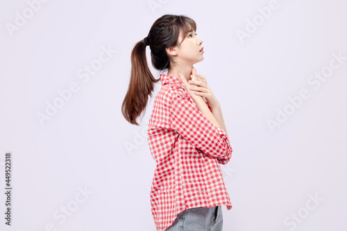 Obraz na plátně Beautiful Asian woman in red shirt