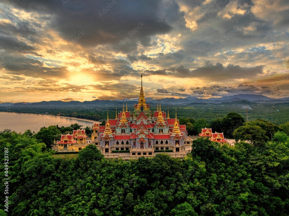 Panorama view of the beautiful Thai temple around with sea and mountains with dramatic cloudy 