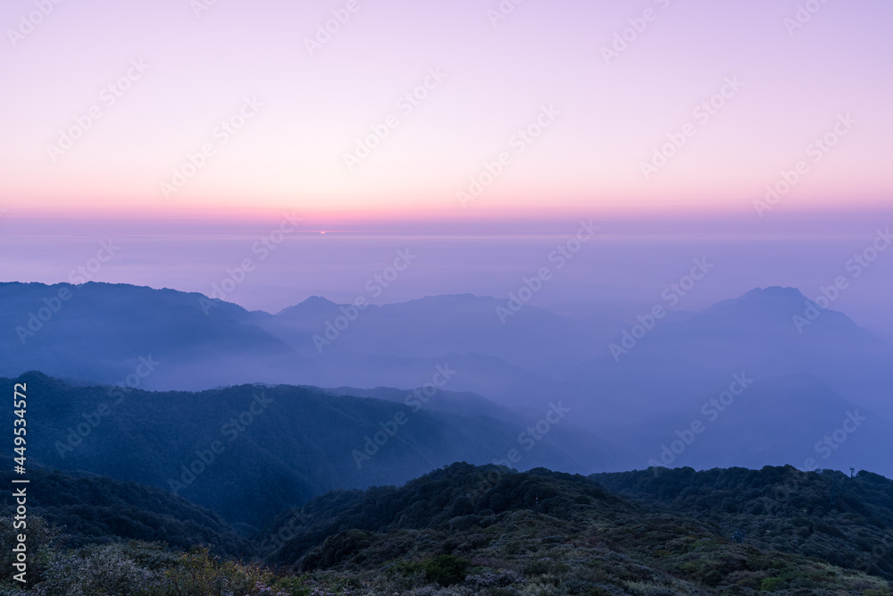 Quiet sunrise, Chinese mountain landscape, foggy weather.