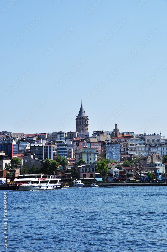 Panoramic view of Istanbul. Galata Tower among residential buildings of the city. July 10, 2021, Istanbul, Turkey.
