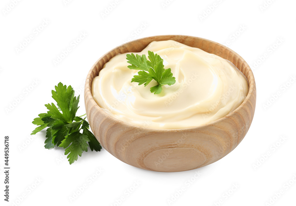 Bowl with delicious mayonnaise and parsley on white background Bowl with delicious mayonnaise and parsley on white background
