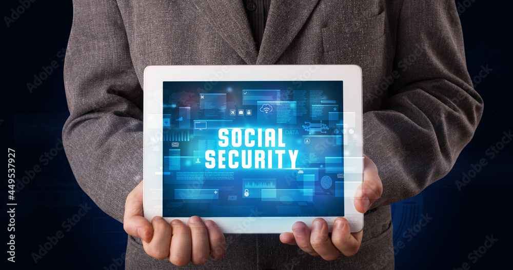 Person holding tablet, security concept Person holding tablet, security concept