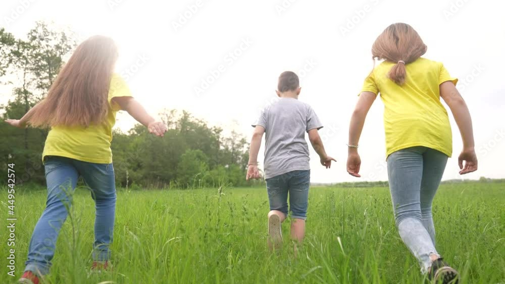 kids run to the park. happy family a children kid together run in the park at sunset silhouette. people in the park concept. kids run. happy family and little baby child summer fun. kid dream concept kids run to the park. happy family a children kid together run in the park at sunset silhouette. people in the park concept. kids run. happy family and little baby child summer fun. kid dream concept