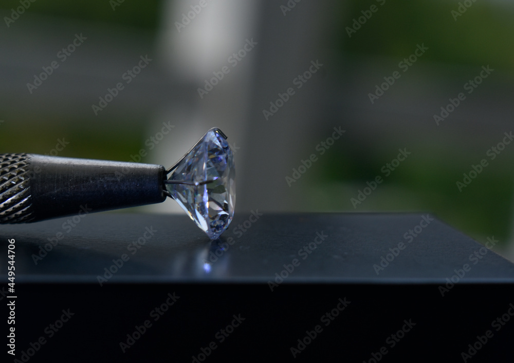 Real diamonds that have been selected and placed in a gemstone holder. for making jewelry Real diamonds that have been selected and placed in a gemstone holder. for making jewelry