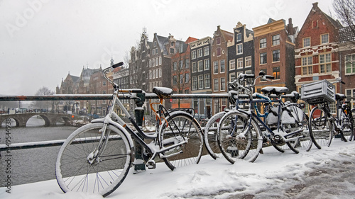 City scenic from a snowy Amsterdm in winter in the Netherlands