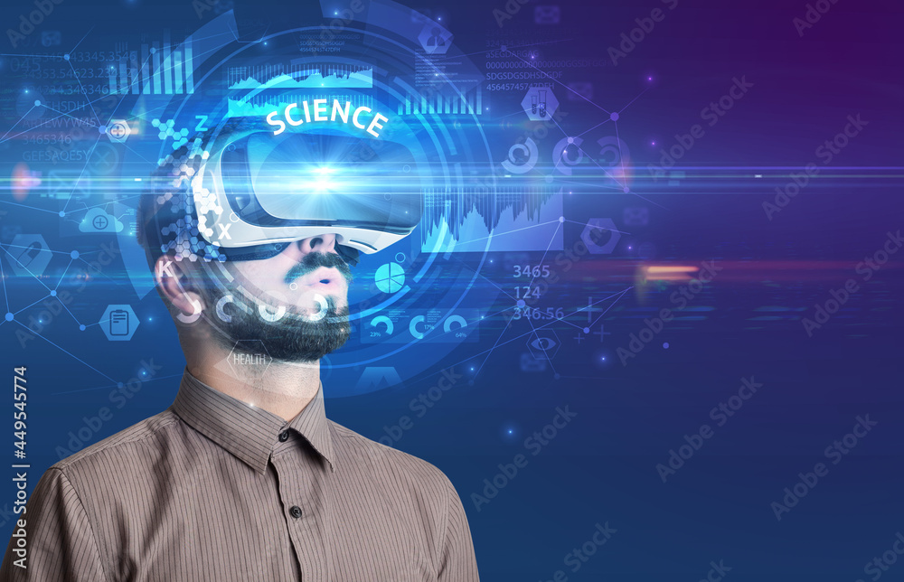 Businessman looking through VR glasses Businessman looking through VR glasses
