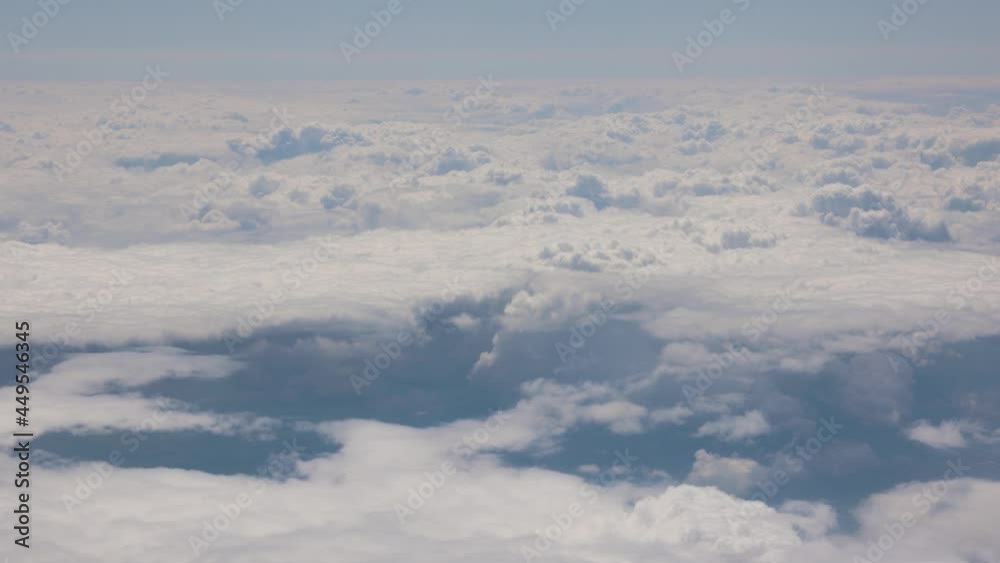 4k vide of clouds seen from plane window during flight 4k vide of clouds seen from plane window during flight