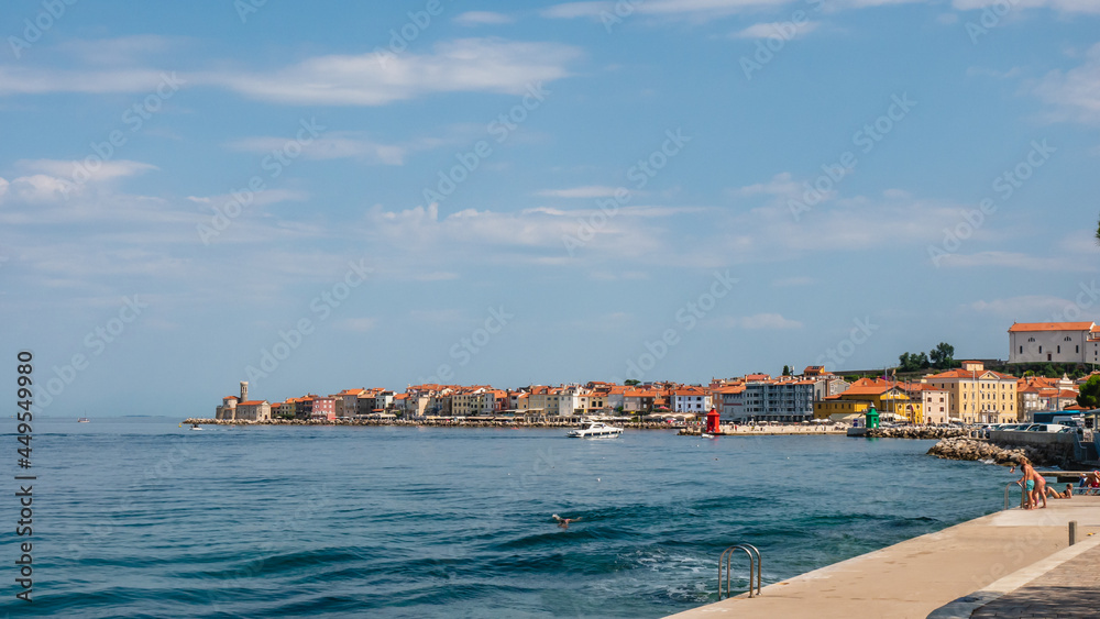View of the town of Piran and the Adriatic Sea and yachts.