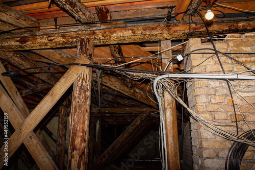 Bild auf Leinwand Old attic with many wires
