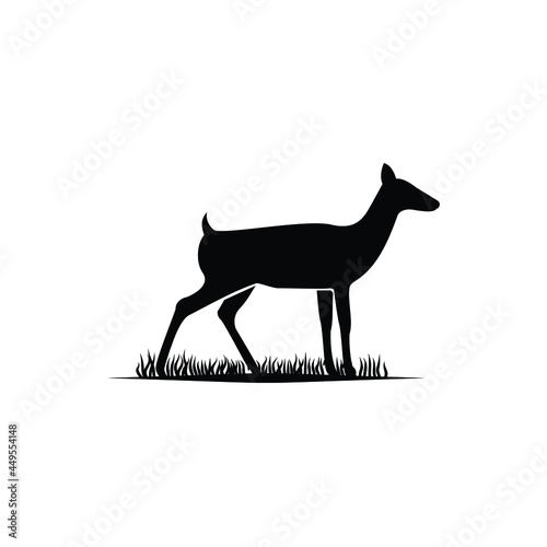 fawn deer doe roe caribou silhouette in the grass logo design
