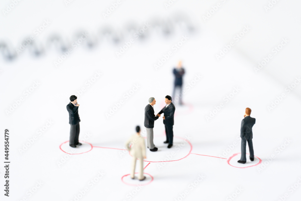Miniature businessman shake hand partner client customers on organization sign with success dealing business using as contract commitment agreement investment and partnership business development join Miniature businessman shake hand partner client customers on organization sign with success dealing business using as contract commitment agreement investment and partnership business development join