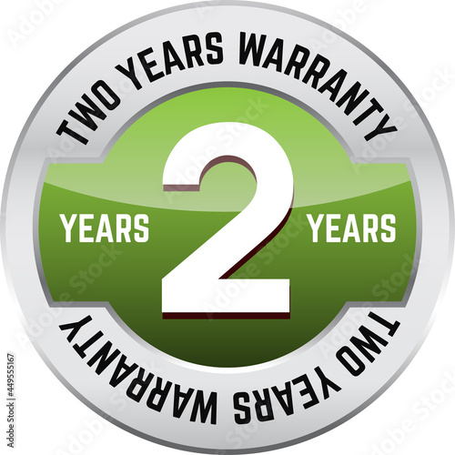 TWO YEARS WARRANTY shiny button. Bright metal shiny circular button with words Two year warranty on it.