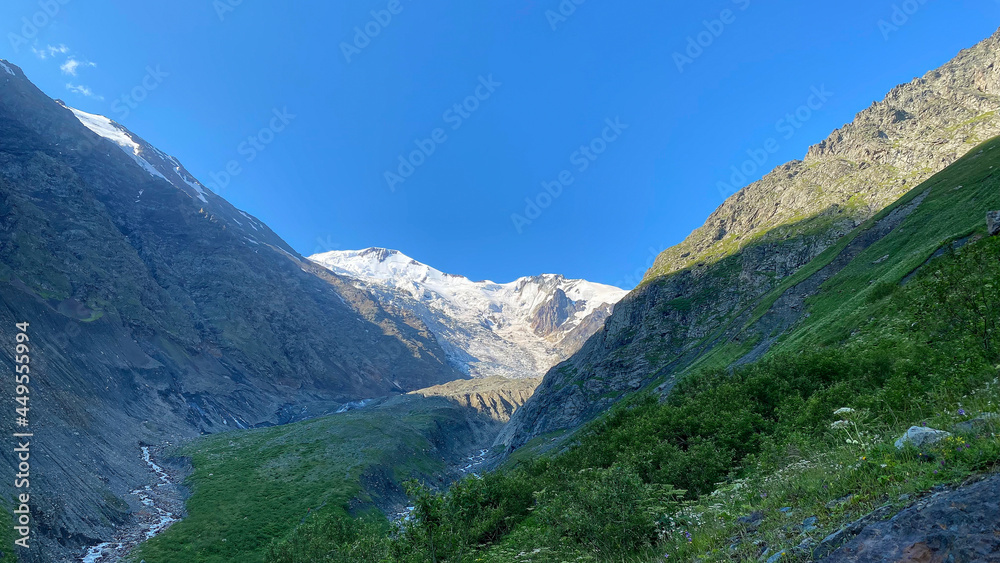 Mountain landscape of North Ossetia. Majestic mountains, green hills and mountain rivers.
