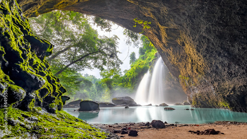 Waterfall in tropical forest at Khao Yai National Park, Thailand. Waterfall view from inside the cave. Amazing of Haew Suwat Waterfall Unseen Khao Yai National Park, Thailand. traveling ecotourism.