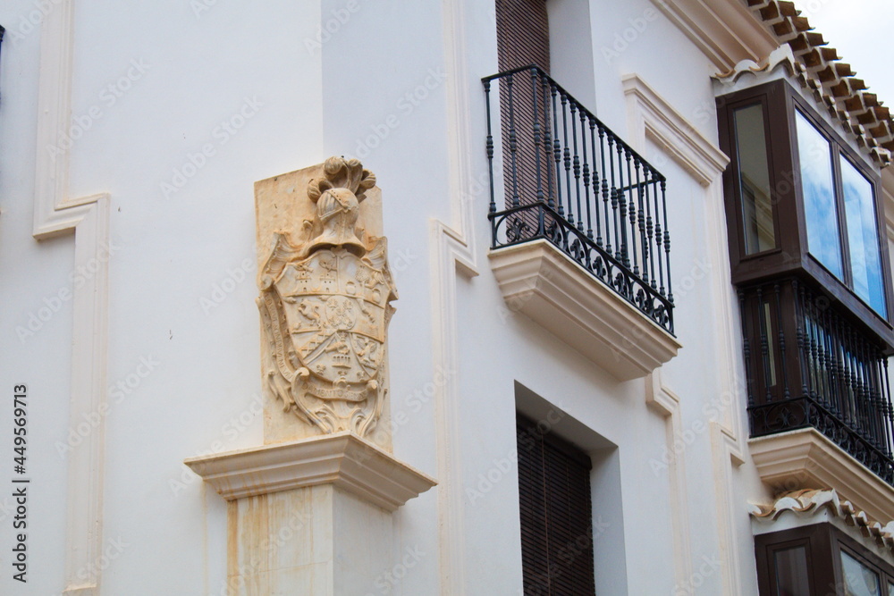 Pretty balconies on narrow streets on a sunny day in Vélez-Rubio, Almería