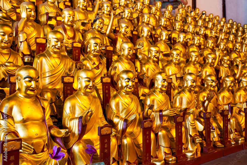 Fototapeta premium Statues of arhats in buddhist temple in Shanghai