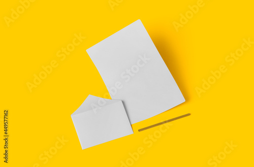 White empty stationery mock up, add your design . simple back to school concept isolated on yellow