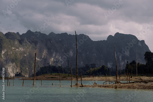 Cheow Lan lake in Khao Sok National Park, Thailand. Tropical landscape at the dawn postcard poster wallpaper photo