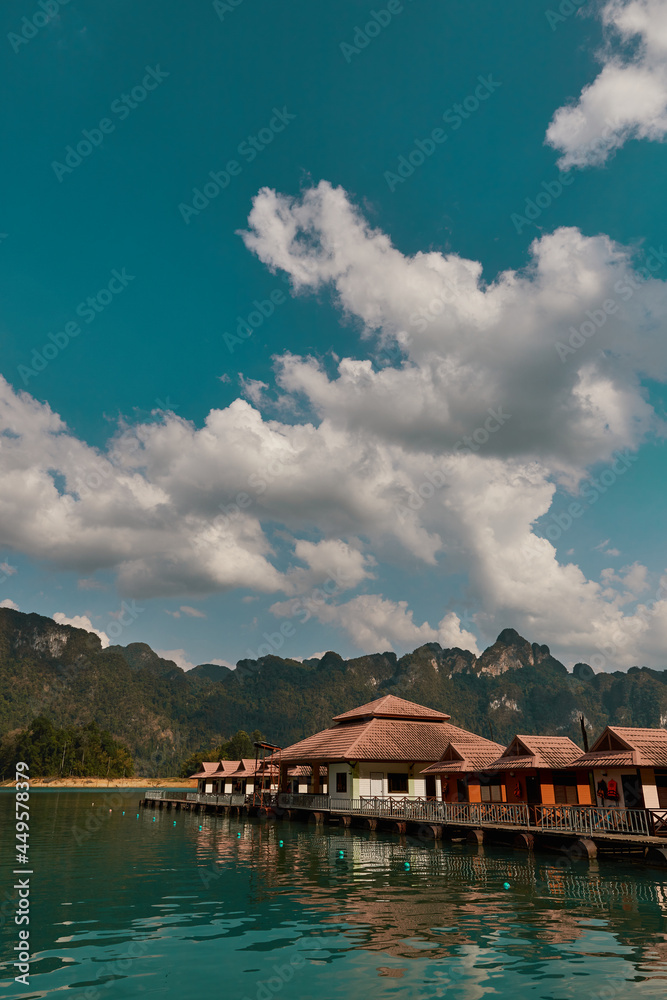 Fototapeta premium Luxury raft houses resort on Cheow Lan lake in Khao Sok National Park, Thailand. Postcard, poster, wallpaper