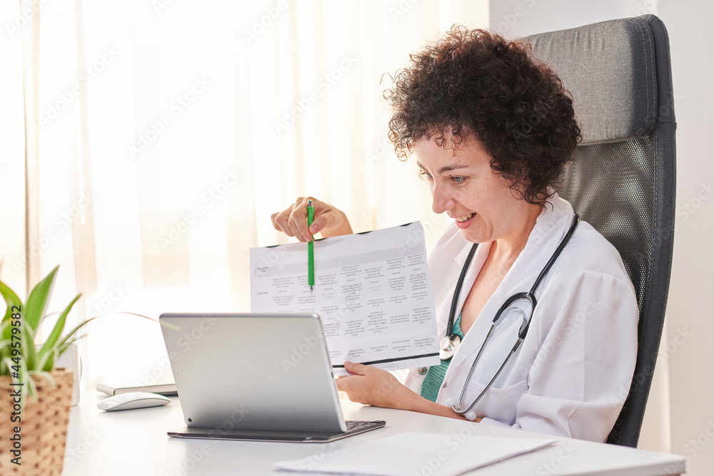 Woman doctor in an online medical consultation via video call Woman doctor in an online medical consultation via video call