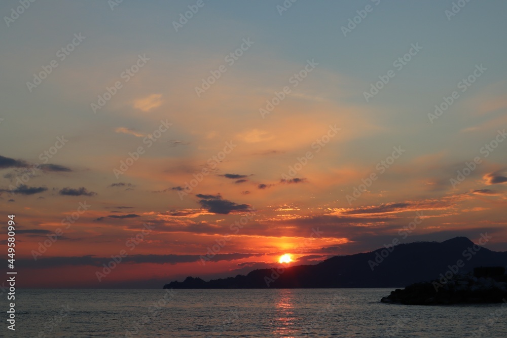 sunset over the sea sunset over the sea