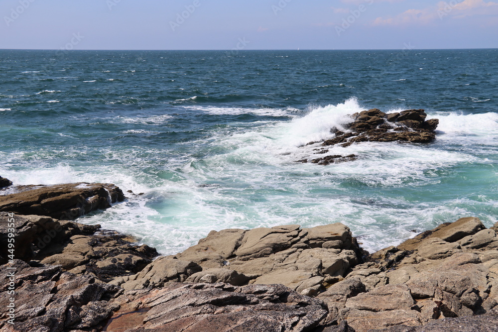 waves crashing on rocks in Brittany 