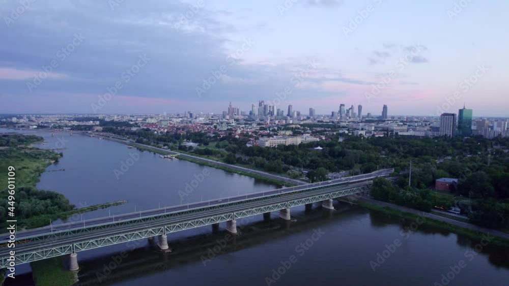 Warsaw at sunset. The capital of Poland is illuminated by a beautiful orange sun. Warsaw at sunset. The capital of Poland is illuminated by a beautiful orange sun.