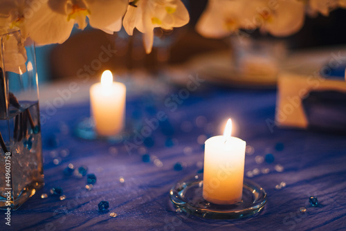 Wedding table decorations with orchids, candle light