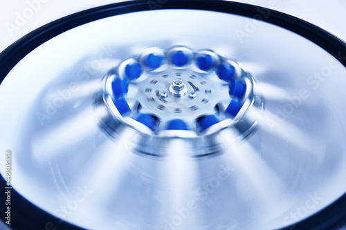 Blood in centrifuge. Platelet-Rich plasma preparation. Tubes with blood in Centrifuge. Blue tonned image