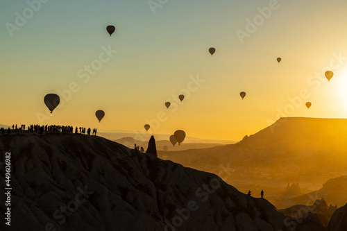 The silhouette of ballons rising at the sunrise in Cappadocia  Turkey