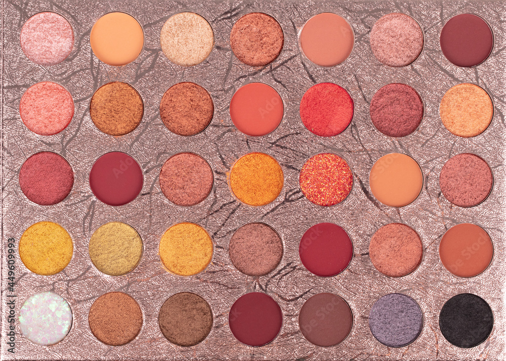 palette of eyeshadow in a brilliant color in luxurious packaging isolated on white background. palette of eyeshadow in a brilliant color in luxurious packaging isolated on white background.