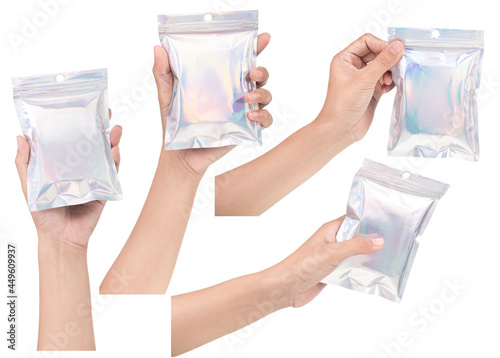 Set of hand holding Aluminum foil bag Plastic Laser Mylar Foil Zip Lock Bag isolated on white background.