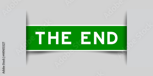 Label sticker green color in word the end that inserted in gray background