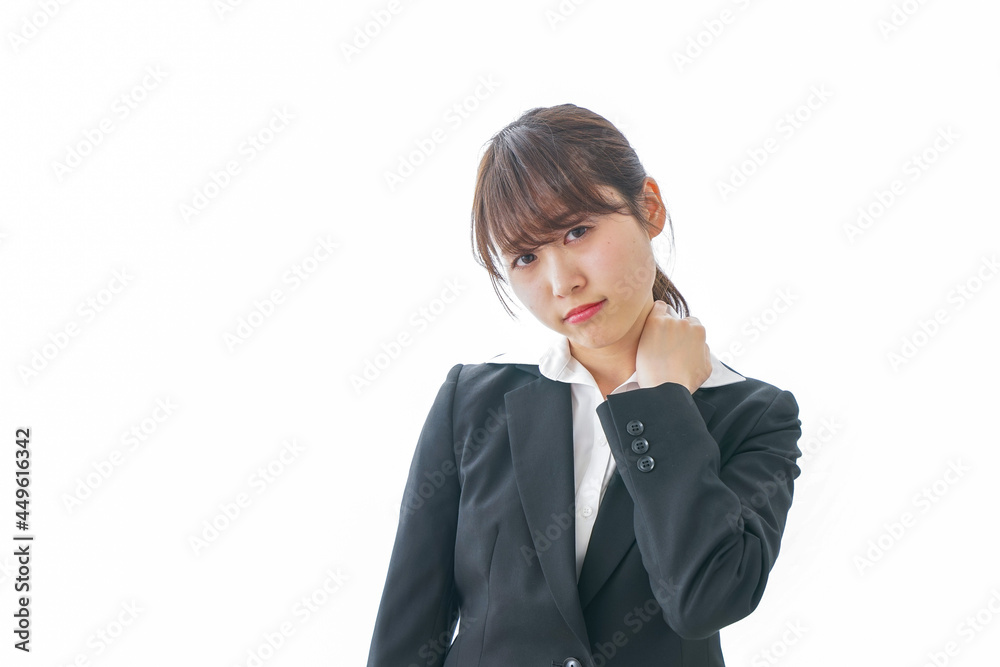肩こりに苦しむビジネスパーソン 肩こりに苦しむビジネスパーソン