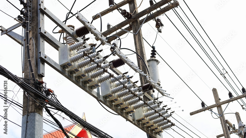 Capacitor bank on pole. Row of devices for optimizing voltage