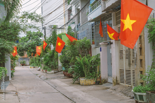 Wallpaper Mural Vietnamese flags are hung from the houses Torontodigital.ca