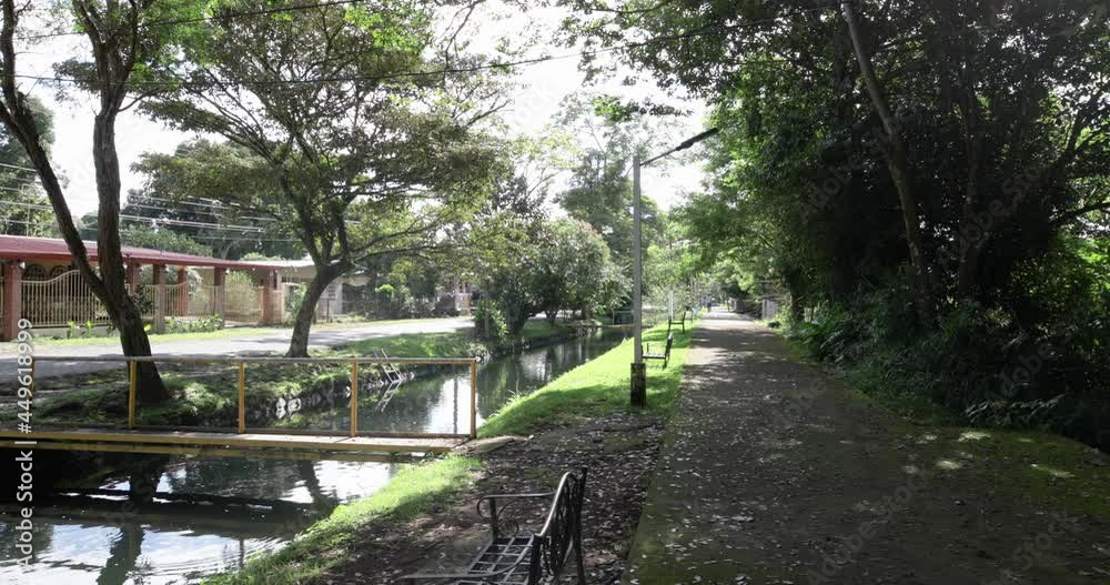 Panama Dolega, riverbanks of artificial canal and footpath