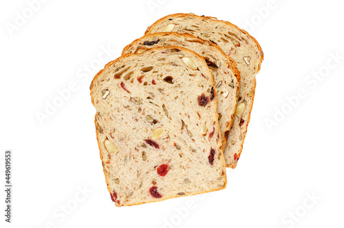 Three sliced pieces of whole wheat and nut bread isolated on white background with clipping path. For healthy or carbohydrate food concept