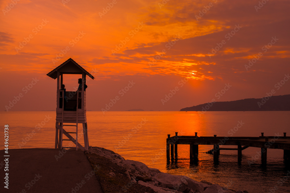 Silhouette of a small pavilion with last sun light in evening at Khao Leam Ya ,Thailand that is relaxing picture.