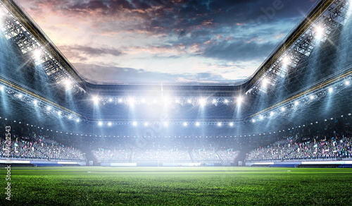 Football stadium background with audience and spotlights photo