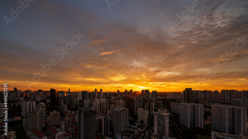 Singapore skyline with burning sunset cloud. © hit1912