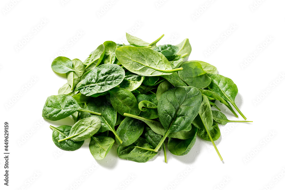 Pile of fresh green baby spinach leaves isolated on white background. - obrazy, fototapety, plakaty 